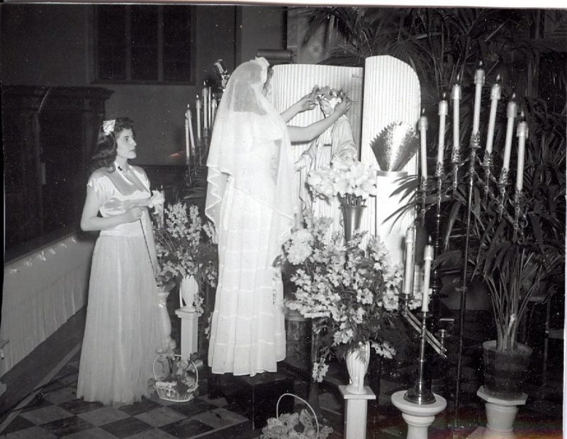 two students crown mary at 1948 may crowning ceremony at catholic elementary school