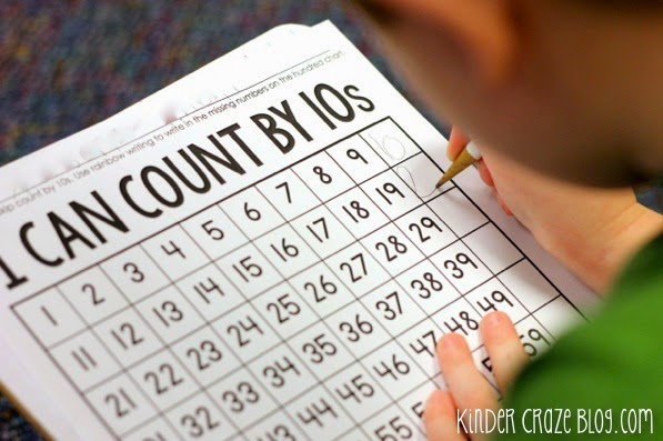 student using pencil to complete "I can count by 10s" worksheet