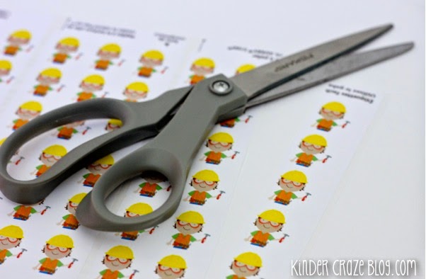coordinating community helper book labels printed on sheet of sticker labels with scissors on top