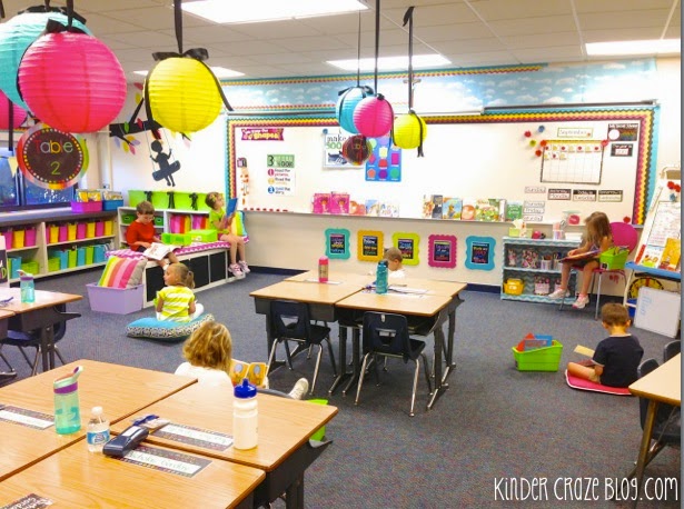 students learning in a kindergarten classroom that wasn't fully decorated by the first day of school