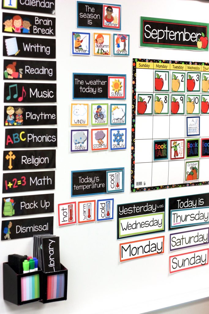 kindergarten classroom calendar set up on magnetic whiteboard with daily schedule displayed