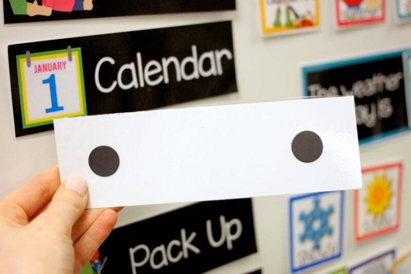 placing dot magnets on the back of classroom schedule cards to display on a magnetic whiteboard
