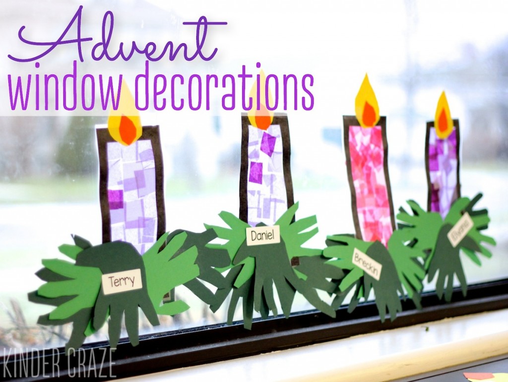 four purple tissue paper candles hang in classroom window "advent window decorations"