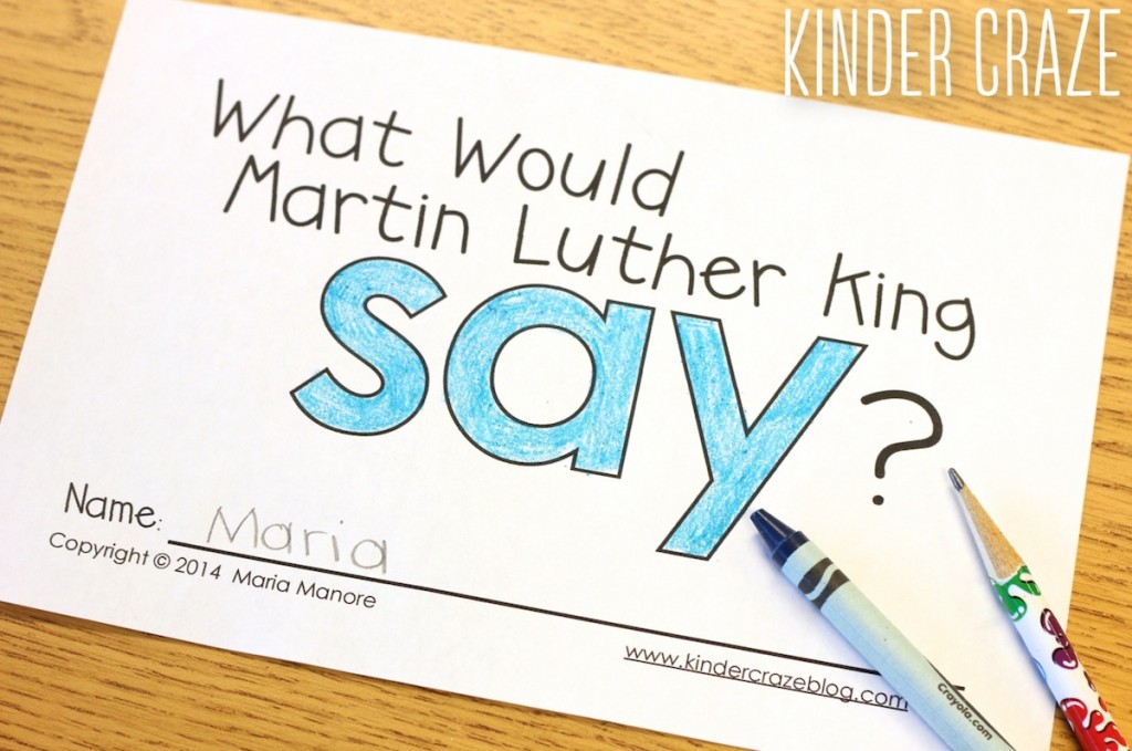 cover page of "What Would Martin Luther King Say" laying on kindergarten desk with the sight word "say" colored in blue crayon and a blue crayon and pencil sit on top