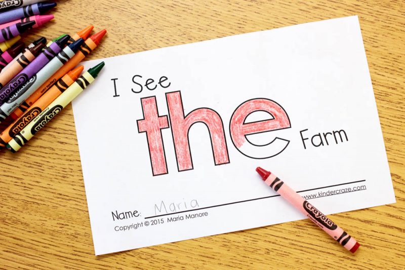 cover page of I see the farm emergent reader on student desk with the word the colored in red crayon