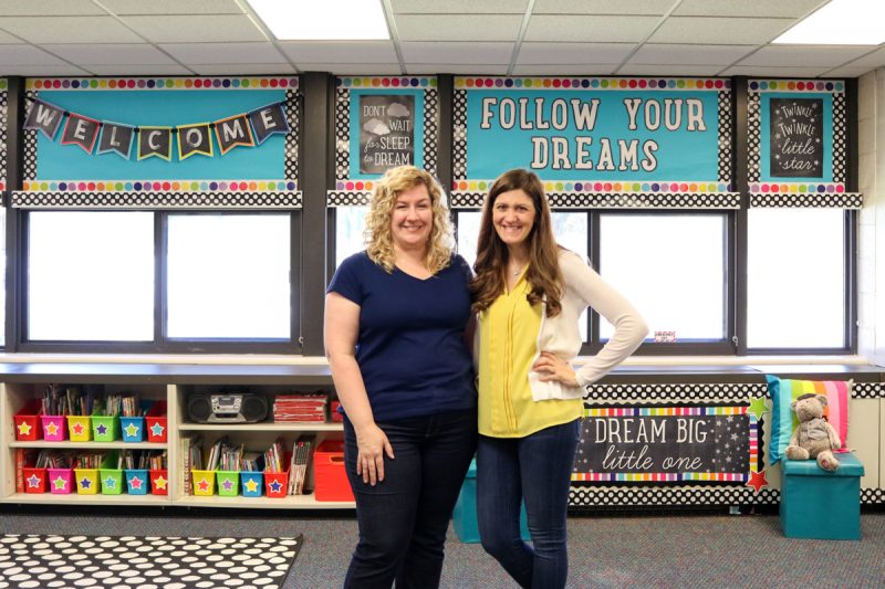 maria gavin from Kinder Craze standing in a classroom with learning center teacher for classroom makeover