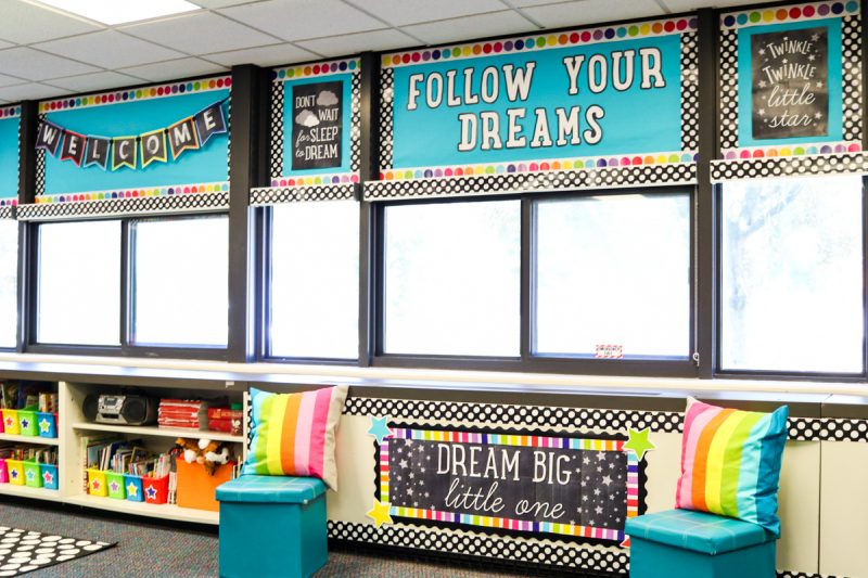 classroom alternative seating in library area with cube storage and colorful pillows