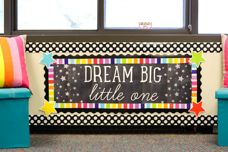 dream big little one banner with rainbow border trim on classroom bulletin board