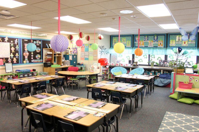 first grade classroom with desks and bright colors
