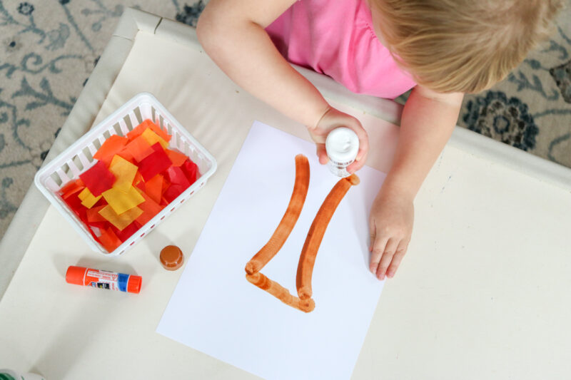 Fall is here! This fall tree craft project is super-simple and uses a few basic supplies to make a stunning tree with falling tissue paper leaves. This fall kids craft is a great project for preschool or kindergarten students. Toddlers can do this one too with a little extra help and support. Perfect for at-home or in a classroom setting. 